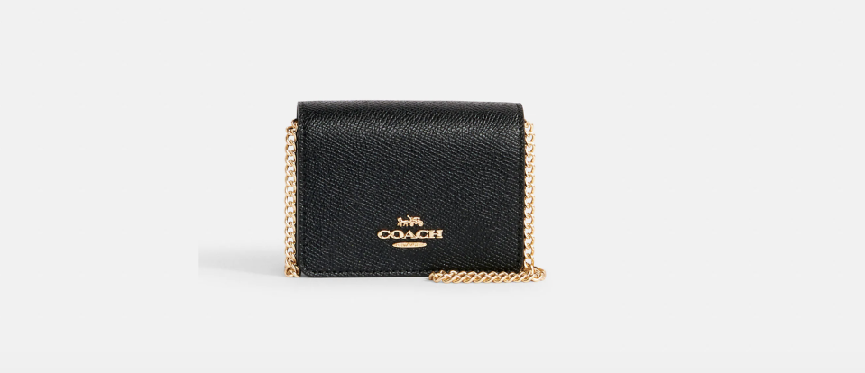 Mini billetera con cadena. (Foto: Coach)