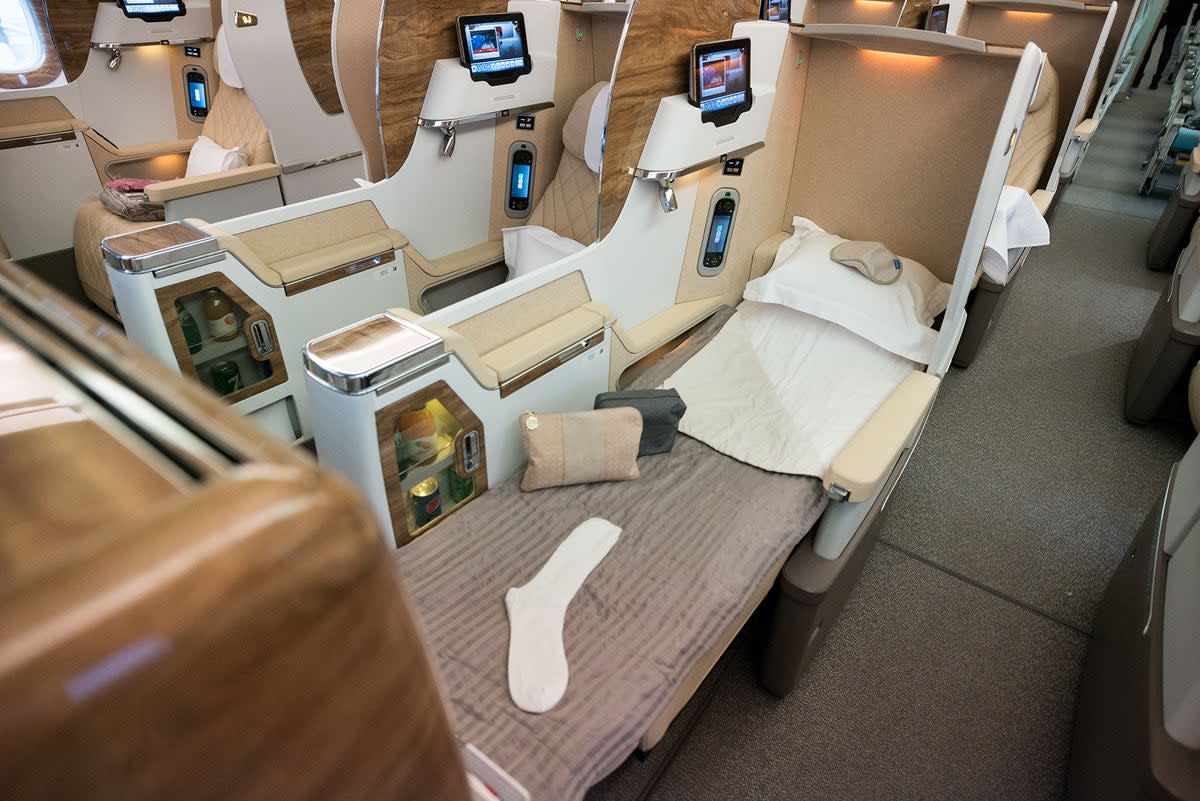 A picture of an Emirates Boeing 777-300 ER business class cabin (Emirates)