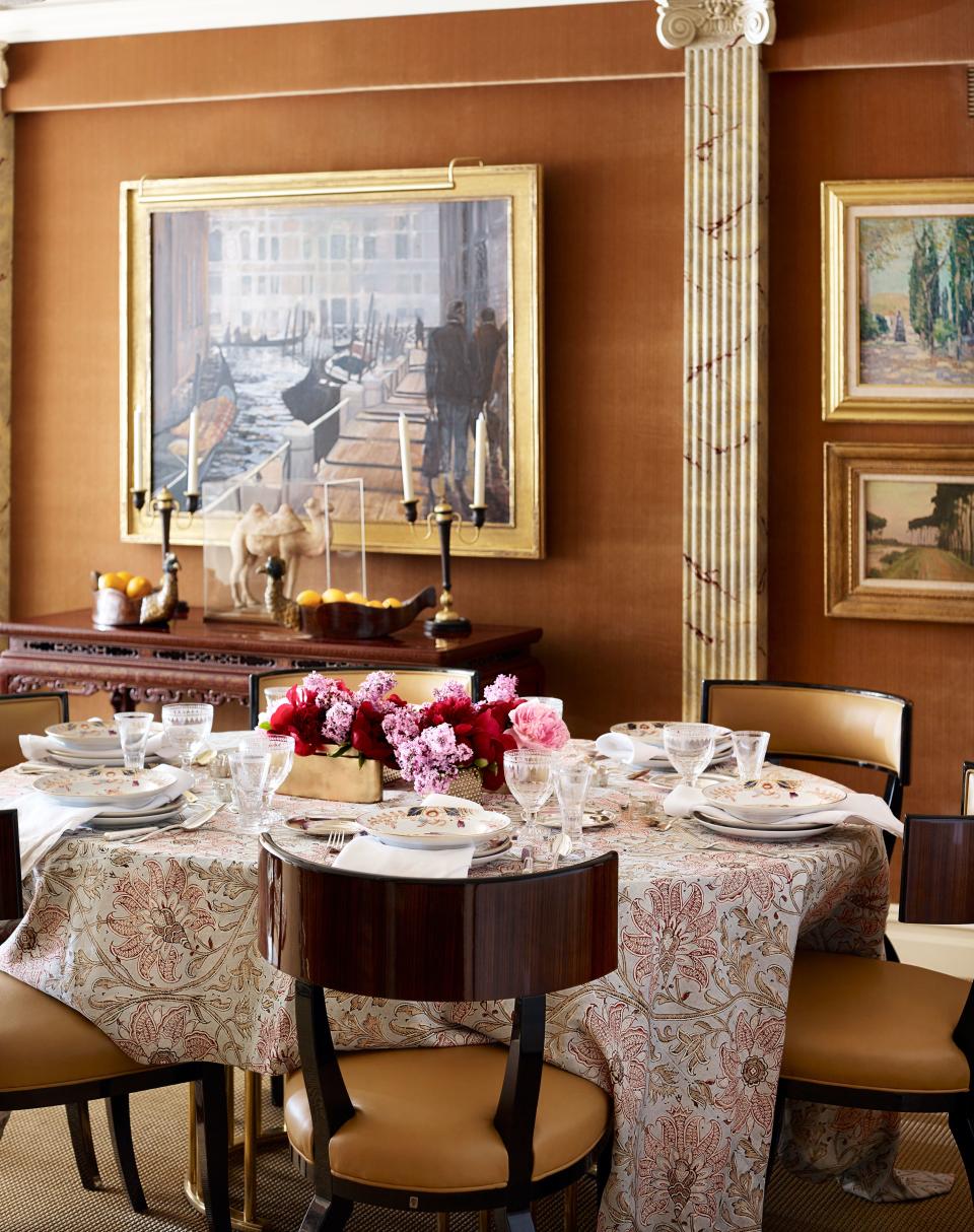 The tablecloth is made of a Zimmer + Rohde cotton-linen blend. Chairs by Nella Vetrina for Visionnaire. On walls, Kravet fabric.