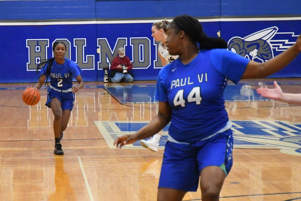 Paul VI sophomore Sharia Baynes looks ahead to junior Makayla Young in a game against Manasquan