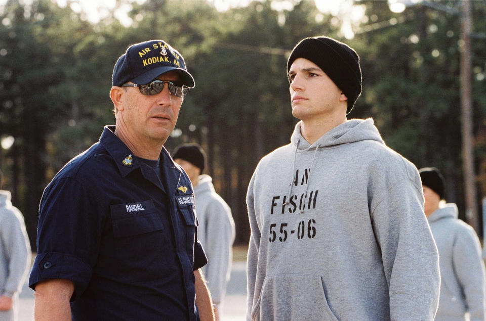 Kevin Costner and Ashton Kutcher in The Guardian. (Photo: ©Touchstone Pictures/Courtesy Everett Collection)
