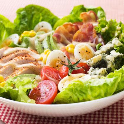 <div class="caption-credit"> Photo by: Thinkstock</div><div class="caption-title">Cobb Salad</div><b>Where You'll Find it:</b> Au Bon Pain, Chick Fil A, Bob Evans <br> <br> <p> <b>Why it's Worse:</b> <a rel="nofollow noopener" href="http://www.shape.com/healthy-eating/diet-tips/12-salads-worse-big-mac?page=12#" target="_blank" data-ylk="slk:Blue cheese;elm:context_link;itc:0;sec:content-canvas" class="link ">Blue cheese</a> , avocado, bacon, chicken, or turkey make up this classic main dish salad, and a main dish it is: depending on the portion size (and they are often huge), the salad can have upwards of 1300 calories and 10-12g saturated fat. </p>