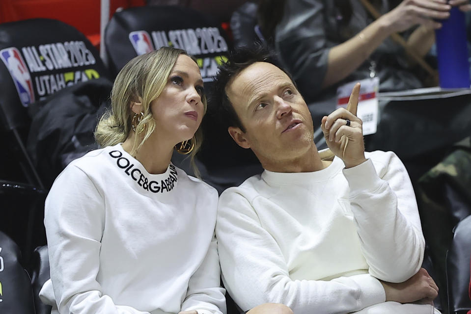 Utah Jazz owner Ryan Smith and wife Ashley sit court side to watch a game between Grambling State and Southern play in the first half of the NBA All-Star HBCU classic college basketball game Saturday, Feb. 18, 2023, in Salt Lake City. (AP Photo/Rob Gray)