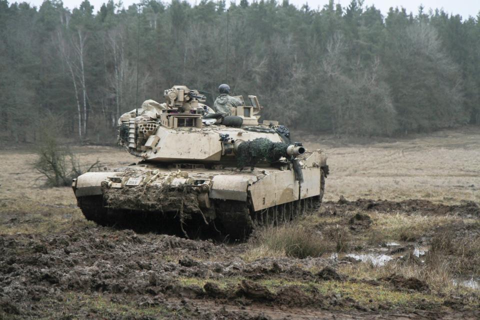 An Abrams tank from 1st Battalion, 8th Cavalry Regiment pulls security during Combined Resolve XIII at the Joint Multinational Readiness Center Hohenfels, Germany, on Feb. 02, 2002.