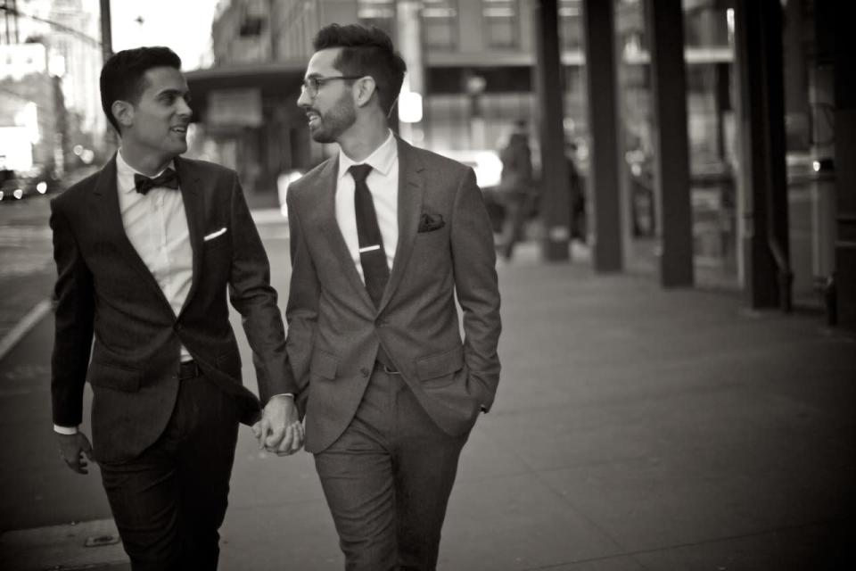 Pat and Billy, who were married in December 2013, hold hands as they stroll through New York’s Meatpacking District.