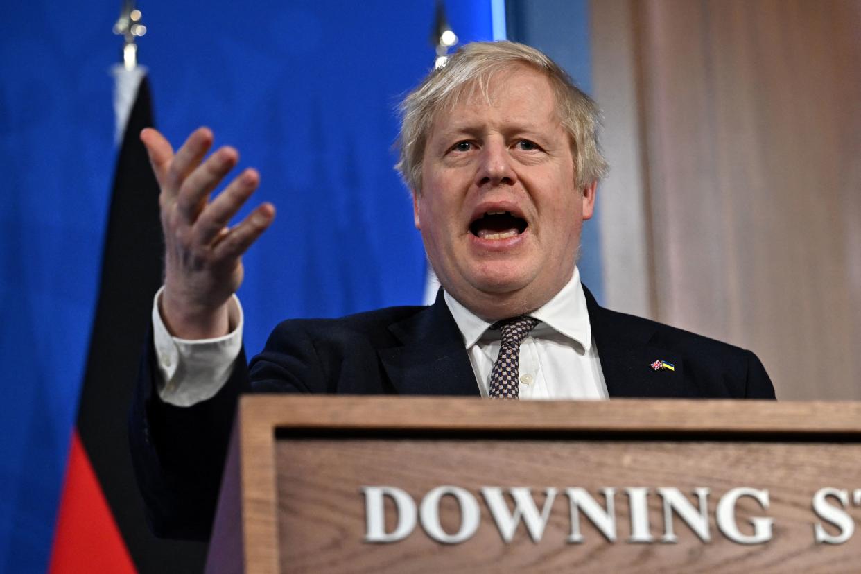 Britain's Prime Minister Boris Johnson speaks during a joint press conference with Germany's Chancellor Olaf Scholz inside the Downing Street briefing room following a bilateral meeting at 10 Downing Street, in London, on April 8, 2022. (Photo by Ben Stansall / POOL / AFP) (Photo by BEN STANSALL/POOL/AFP via Getty Images)