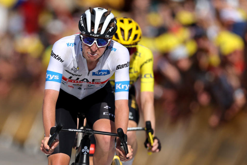 UAE Team Emirates' Slovenian rider Tadej Pogacar wearing the best young rider's white jersey cycles ahead of Jumbo-Visma's Danish rider Jonas Vingegaard wearing the overall leader's yellow jersey, to the finish line of the 14th stage of the 110th edition of the Tour de France cycling race, 152 km between Annemasse and Morzine Les Portes du Soleil, in the French Alps, on July 15, 2023. (Photo by Thomas SAMSON / AFP)