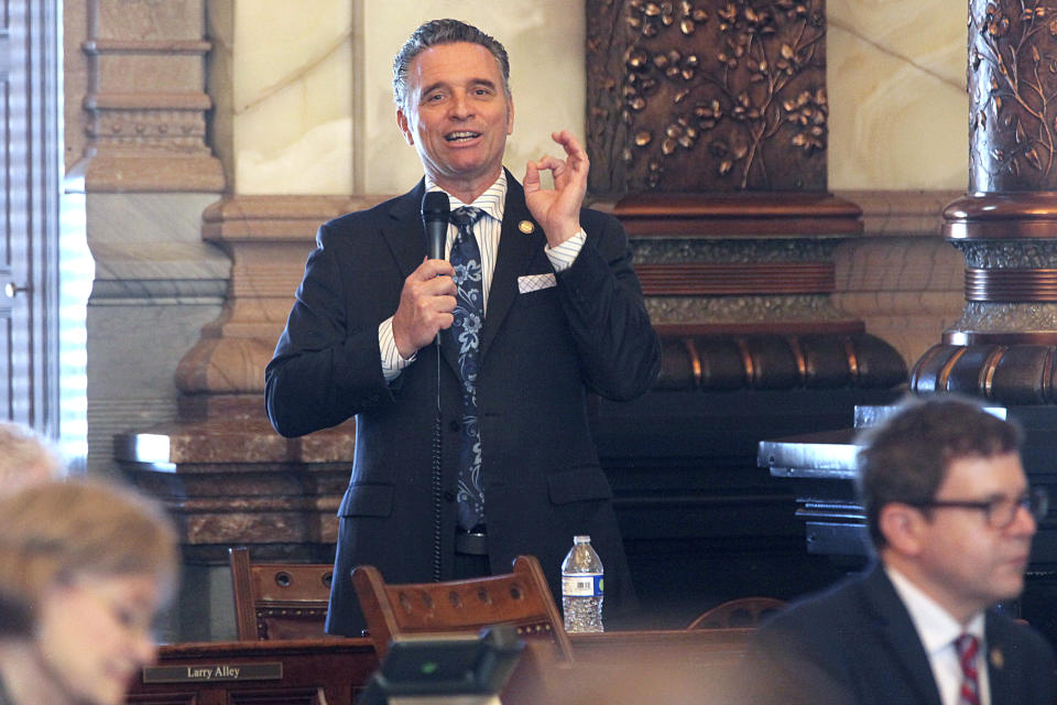 Kansas Senate President Ty Masterson, R-Andover, makes a point during the Senate's debate on a bill cutting income, sales and property taxes, Thursday, April 4, 2024, at the Statehouse in Topeka, Kan. Top GOP leaders and Democratic Gov. Laura Kelly drafted the plan as a compromise. (AP Photo/John Hanna)