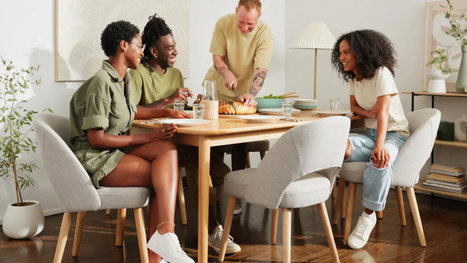 Koala furniture's Serenity dining table and Curved dining chairs.