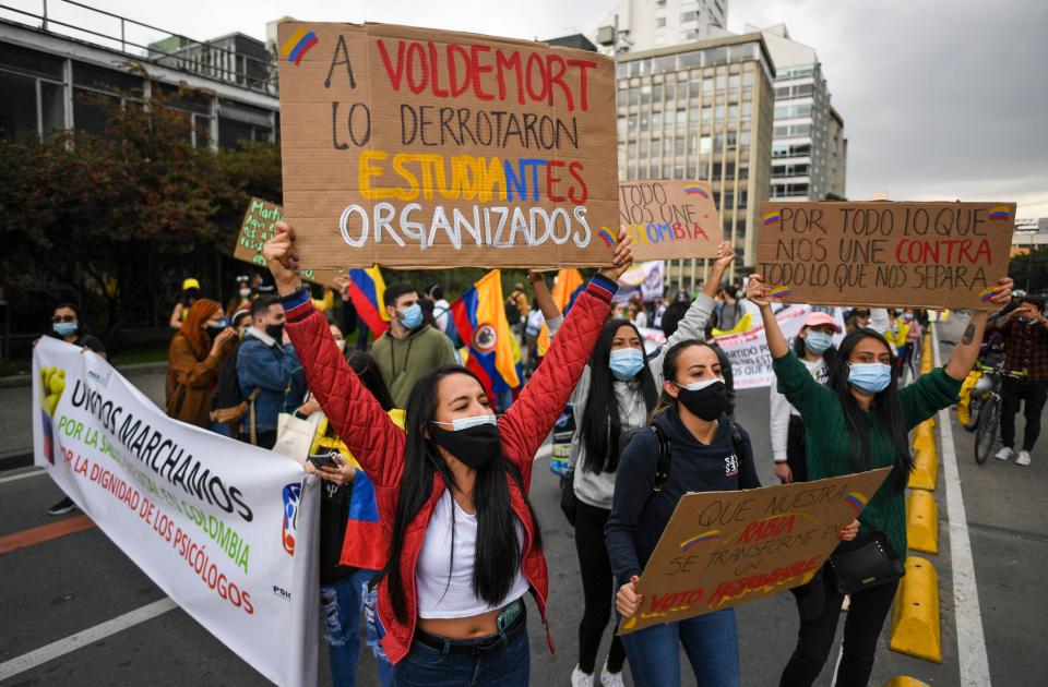 People protest against the government in Bogota on May 8, 2021. - Facing anti-government protests that have spiraled into deadly violence, Colombian President Ivan Duque is holding a series of talks with his political foes in search of a way out of the crisis. (Photo by Juan BARRETO / AFP) (Photo by JUAN BARRETO/AFP via Getty Images)