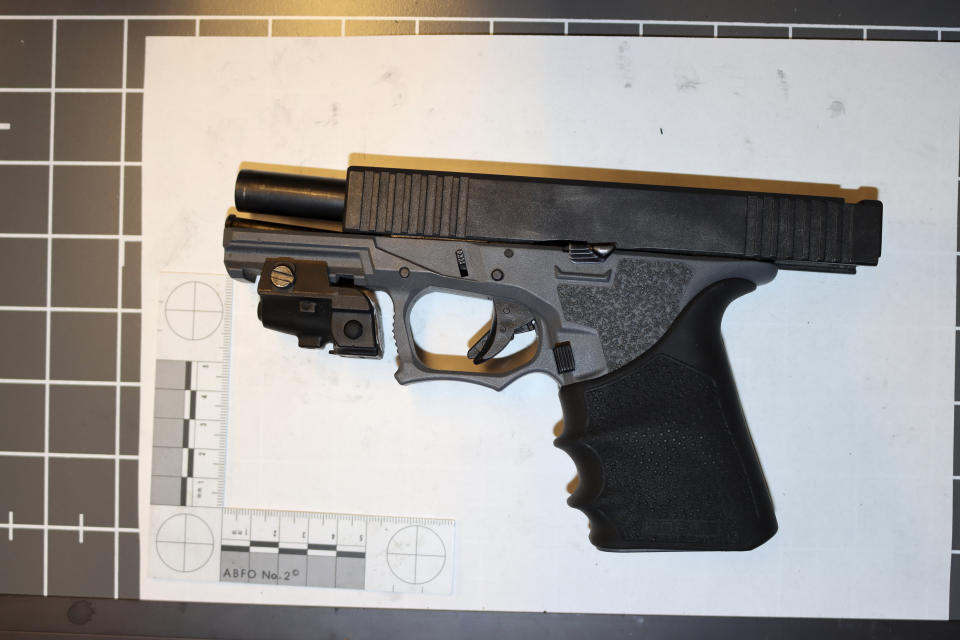 This image taken May 3, 2022, and provided by the Oak Park, Ill., Police Department shows a ghost gun found in a backpack taken from Keyon Robinson outside Oak Park and River Forest High School in Oak Park, Ill. Robinson was a senior at the high school at the time and said he had brought the gun to school to protect himself after an altercation with a relative. Robinson bought the ghost gun, which has no serial number, via a gun seller who advertised on the social media site Snapchat. Many ghost guns are made with 3D printers. Illinois is among states that have passed laws to try to keep them off the streets. (Oak Park Police Department via AP0
