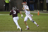 Arkansas quarterback Feleipe Franks (13) releases a pass past Mississippi State linebacker Aaron Brule (3) during the first half of an NCAA college football game in Starkville, Miss., Saturday, Oct. 3, 2020. (AP Photo/Thomas Graning)