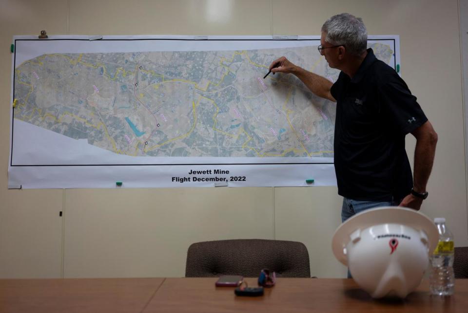 Joe Harris, 56, planning specialist and former reclamation supervisor, left, explains the environmental reclamation process at the NRG Jewett Mine in Jewett on June 29, 2023.