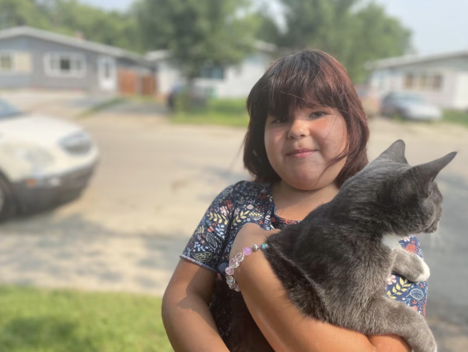 Vada Harvey and her kitten, Rebecca. (Dan Zakreski/CBC)