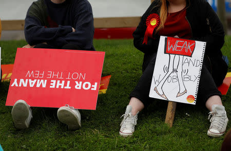 Supporters wait for Jeremy Corbyn, leader of Britain's opposition Labour Party, to arrive at a campaign event in Reading, May 31, 2017. REUTERS/Peter Nicholls