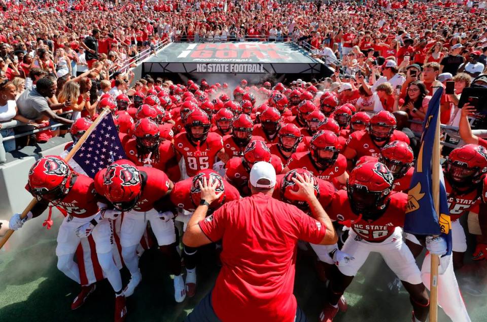 N.C. State head coach Dave Doeren gets ready to lead the team onto the field before the Wolfpack’s game against VMI at Carter-Finley Stadium in Raleigh, N.C., Saturday, Sept. 16, 2023.