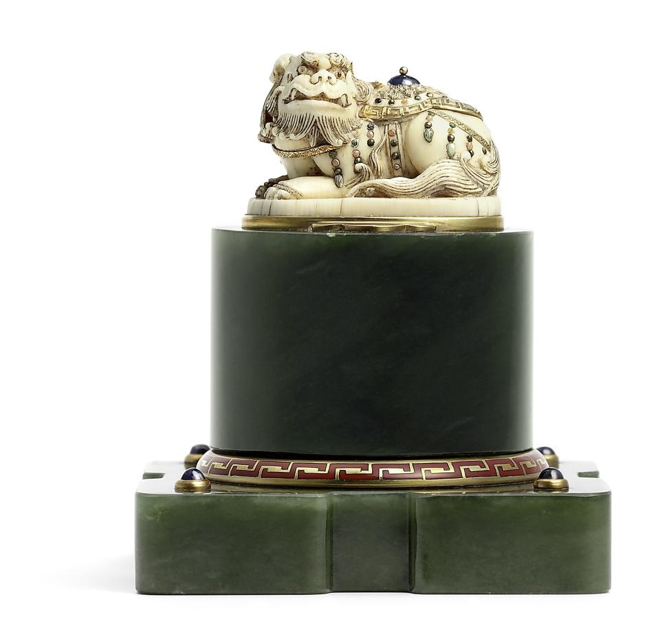 A Cartier jade paperweight