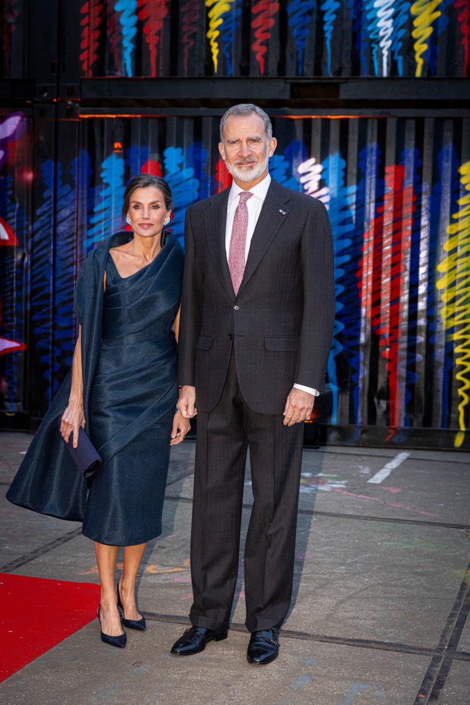 Queen Letizia of Spain, at left, and King Felipe visit the exposition of ten Spanish and Dutch mural painters at Museum STRAAT on April 18.