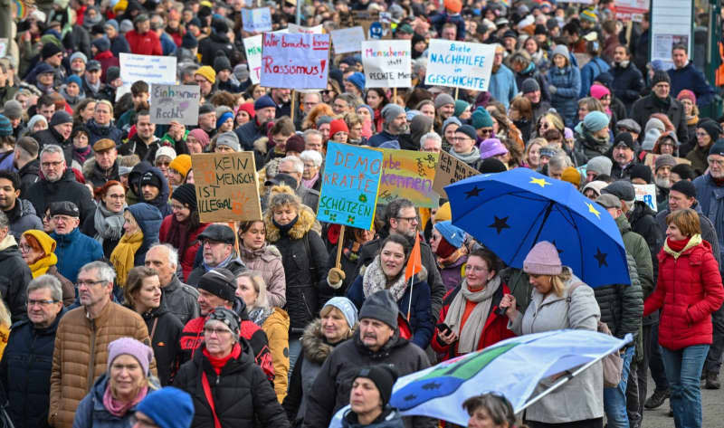 Participants walk through the German-Polish border town in the east of Brandenburg during the "Never again is now!" demonstration against right-wing extremist activities. Patrick Pleul/dpa