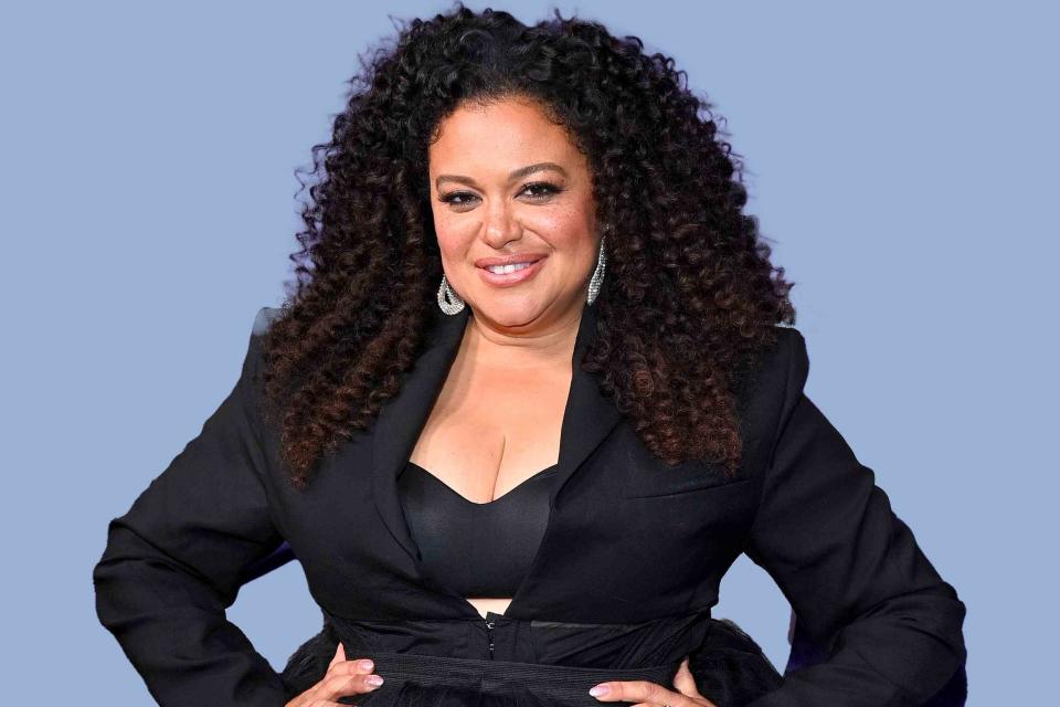 <p>Roy Rochlin/Getty Images</p> Photo of Michelle Buteau wearing all black 