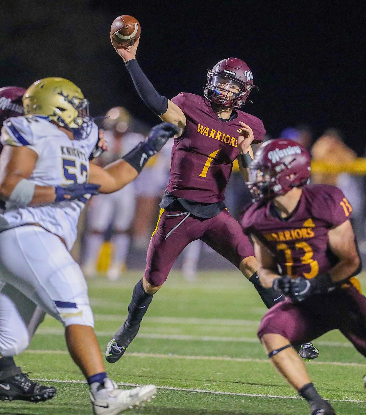 Walsh JesuitÕs quarterback Ryan Kerscher gets off a pass against Hoban on Friday, Sept. 23, 2022 in Cuyahoga Falls, Ohio. [Phil Masturzo/ Beacon Journal] 