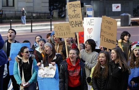 Students from Lincoln high school demonstrate in support of teachers in contract negotiations during a school walkout in Portland, Oregon February 5, 2014. REUTERS/Steve Dipaola