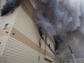 <p>Members of the Emergency Situations Ministry work to extinguish a fire in a shopping mall in the Siberian city of Kemerovo, Russia, on March 25, 2018. (Photo: Marina Lisova/Reuters) </p>