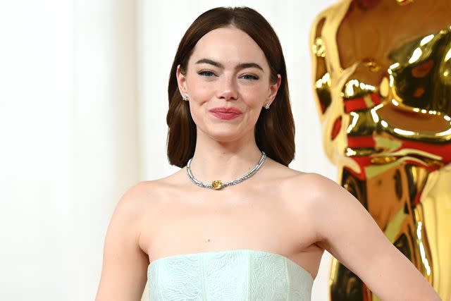 <p>Gilbert Flores/Getty</p> Emma Stone at the 96th Oscars