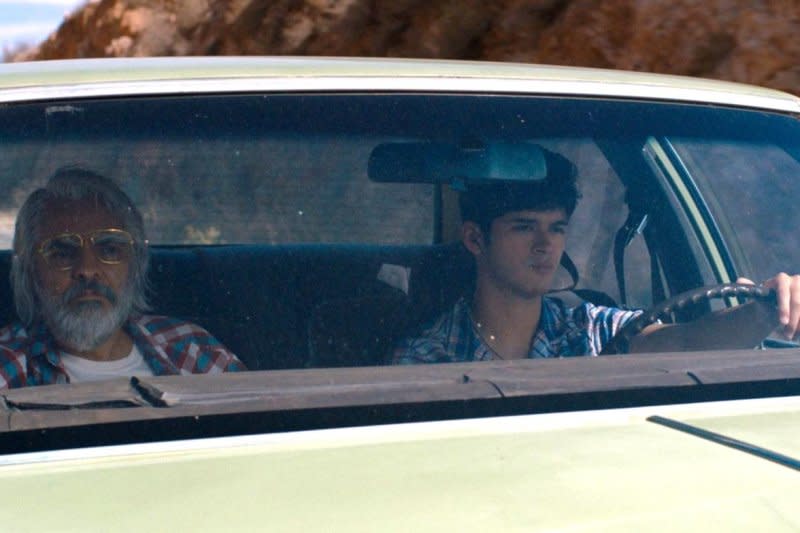 Aristotle (Max Pelayo, L) gets driving lessons from his father (Eugenio Derbez). Photo courtesy of Blue Fox Entertainment