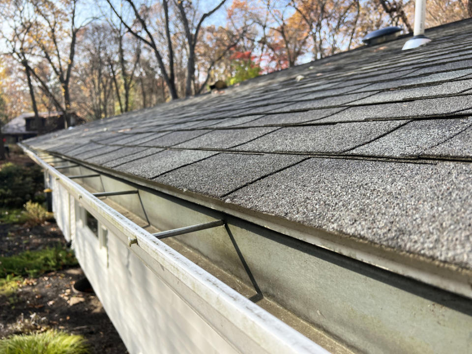 Inspect your gutters and roof shingles for signs of weakening or damage.<p>Emily Fazio</p>