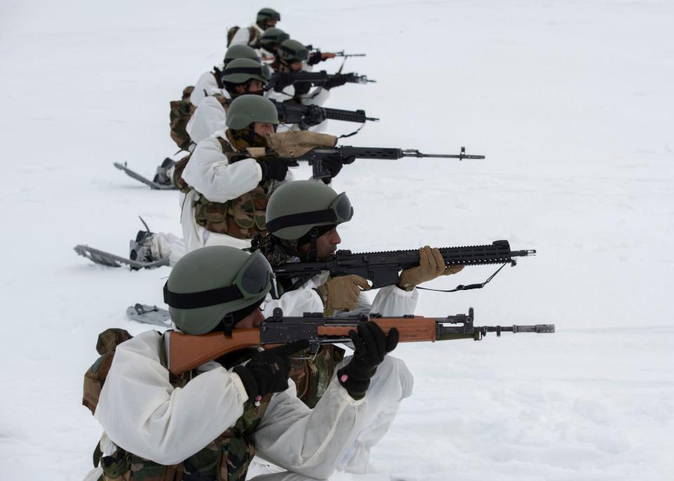 Indian soldiers with rifles in Alaska