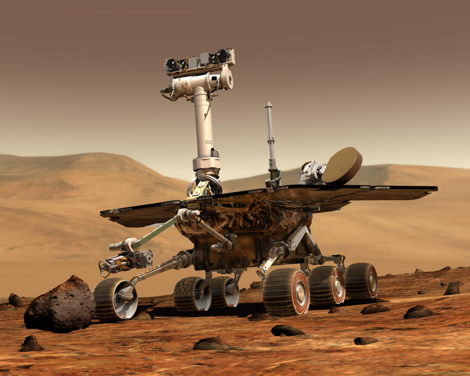 This artist rendering released by NASA shows the NASA rover Opportunity on the surface of Mars. Opportunity landed on the red planet on Jan. 24, 2004 and is still exploring. Its twin Spirit stopped communicating in 2010. (AP Photo/NASA)