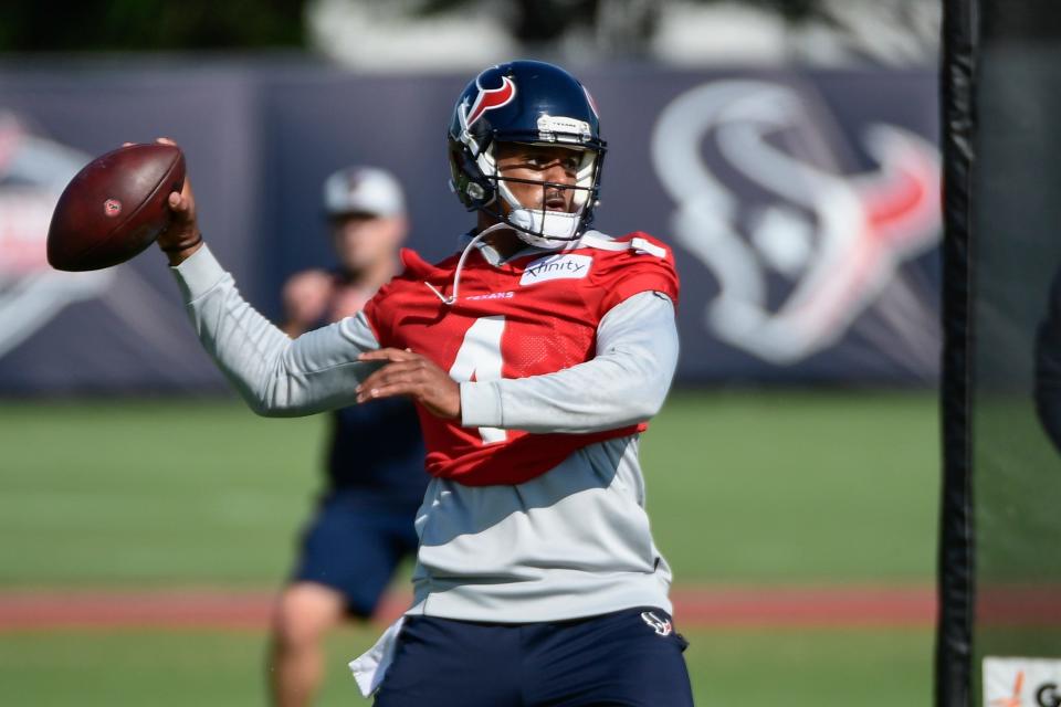 Houston Texans quarterback Deshaun Watson (4) throws the ball during NFL football practice Wednesday, July 28, 2021, in Houston.