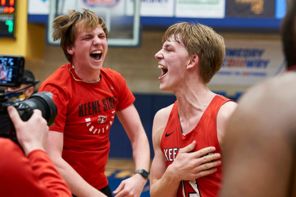 Jeff Hunter, of Hudson, Mass., celebrates during a Keene State College men's basketball game.