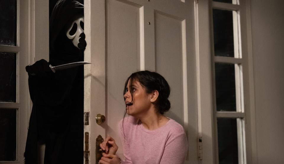 Ghostface and Jenna Ortega in Paramount Pictures and Spyglass Media Group’s “Scream.” - Credit: Paramount
