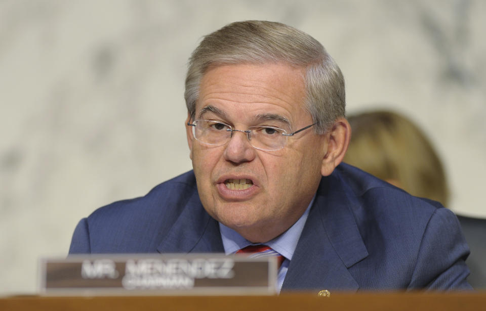 FILE - In this Sept. 4, 2013, file photo, Sen. Robert Menendez, D-N.J. speaks at Capitol Hill in Washington. Congress will weigh some of the most significant U.S. sanctions on Russia since the end of the Cold War in a bid to pressure President Vladimir Putin to pull Russian troops out of Crimea, according to a copy of a new Senate bill obtained by The Associated Press. Menendez, chairman of the Foreign Relations panel, introduced the legislation. (AP Photo/Susan Walsh, File)