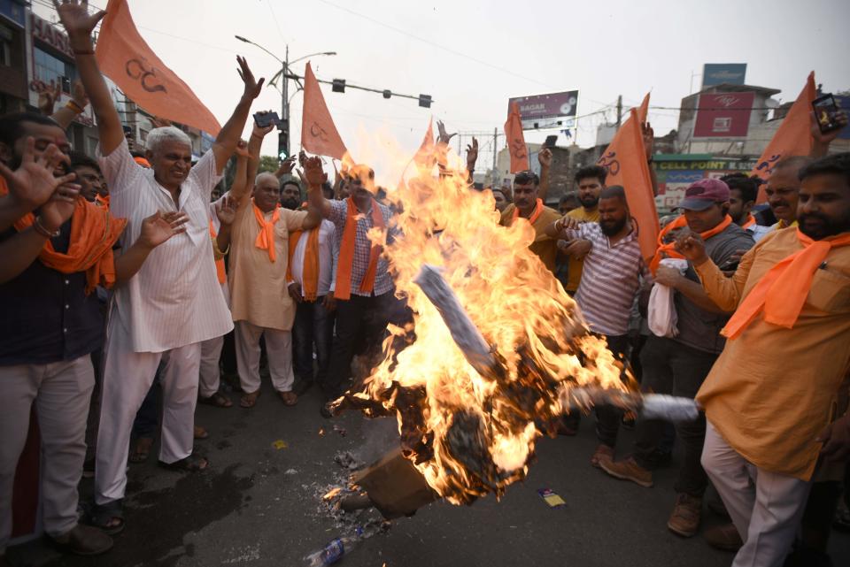 Members of the far-right Hindu activist groups Vishwa Hindu Parishad (VHP) and Bajrang Dal burn an effigy representing Islamic terrorism in Gurugram, outside India's capital city of Delhi, to protest the murder of a Hindu tailor, in a June 29, 2022 file photo.  / Credit: Parveen Kumar/Hindustan Times/Getty