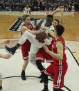 <p>Villanova forward Darryl Reynolds (45) grabs a rebound against Wisconsin guard Brevin Pritzl,left, guard Zak Showalter, center, and guard Bronson Koenig,right, during the first half of a second-round men’s college basketball game in the NCAA Tournament, Saturday, March 18, 2017, in Buffalo, N.Y. (AP Photo/Bill Wippert) </p>