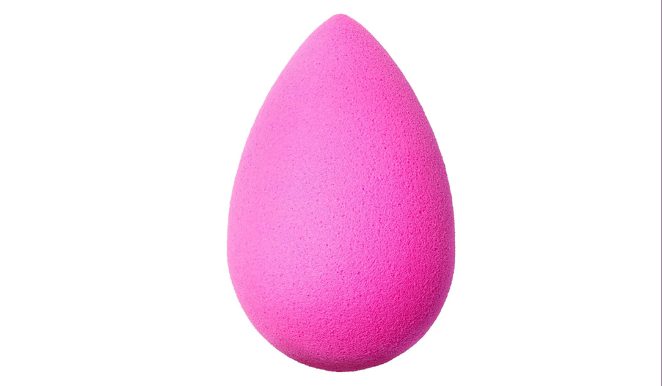 hot pink beautyblender on a white background