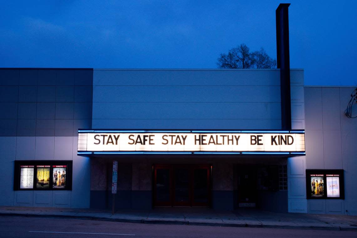 The marquee of the closed Rialto Theater on Glenwood Avenue displays a message during the COVID-19 coronavirus outbreak in N.C. Saturday night, March 21, 2020.