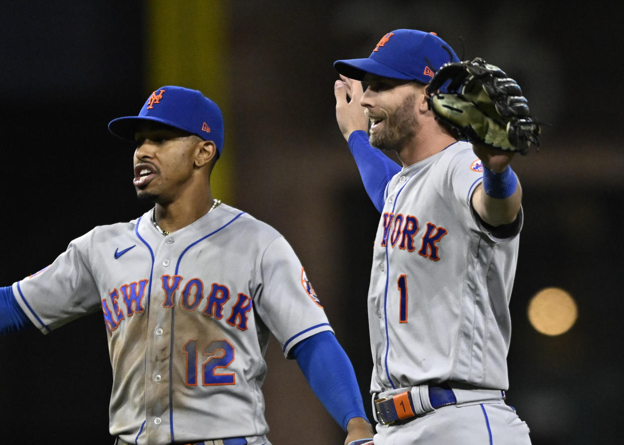 SAN DIEGO, CA - JULY 7: Francisco Lindor #12 of the New York Mets and Jeff McNeil #1 celebrate after the Mets beat the Padres 7-5 in a baseball game  July 7, 2023 at Petco Park in San Diego, California. (Photo by Denis Poroy/Getty Images)