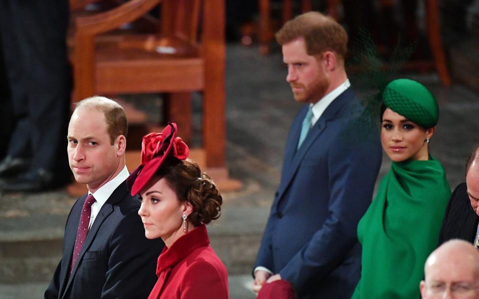 The final straw: Duke and Duchess of Sussex standing behind the Duke and Duchess of Cambridge, during the Commonwealth Service at Westminster Abbey, in March 2020 - PA