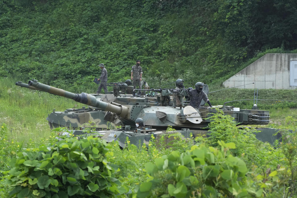 FILE - South Korean army soldiers prepare for an exercise at a training field in Paju, South Korea, near the border with North Korea, Wednesday, July 27, 2022. In a Friday, Aug. 19, 2022, commentary published by local media, Kim Yo Jung, sister of North Korean leader Kim Jong Un, says her country will never accept South Korean President Yoon Suk Yeol’s “foolish” offer of economic benefits in exchange for denuclearization steps, accusing Seoul of recycling past proposals Pyongyang already rejected. (AP Photo/Ahn Young-joon, File)