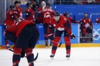 Ice Hockey - Pyeongchang 2018 Winter Olympics - Men Semifinal Match - Canada v Germany - Gangneung Hockey Centre, Gangneung, South Korea - February 23, 2018 - Wojtek Wolski of Canada and teammates react in dejection after losing to Germany. REUTERS/Brian Snyder
