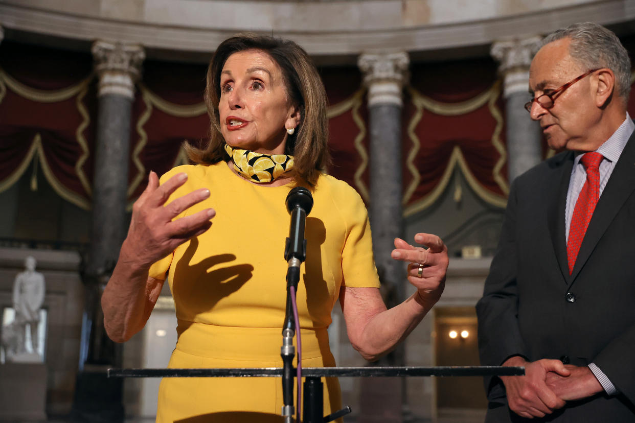 WASHINGTON, DC - AUGUST 03: Speaker of the House Nancy Pelosi (D-CA) and Senate Minority Leader Charles Schumer (D-NY) talk with reporters in Statuary Hall in the U.S. Capitol August 03, 2020 in Washington, DC. Negotiations between Pelosi, Schumer, White House Chief of Staff Mark Meadows and Treasury Secretary Steven Mnuchin continued Monday but they did not reach an agreement on how to move forward on a new relief package to help people and businesses weather the COVID-19 pandemic. (Photo by Chip Somodevilla/Getty Images)