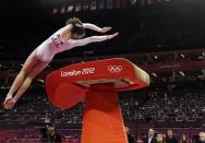 <p>U.S. gymnast McKayla Maroney performs during the artistic gymnastics women’s vault finals at the 2012 Summer Olympics, Sunday, Aug. 5, 2012, in London. (AP Photo/Julie Jacobson) </p>