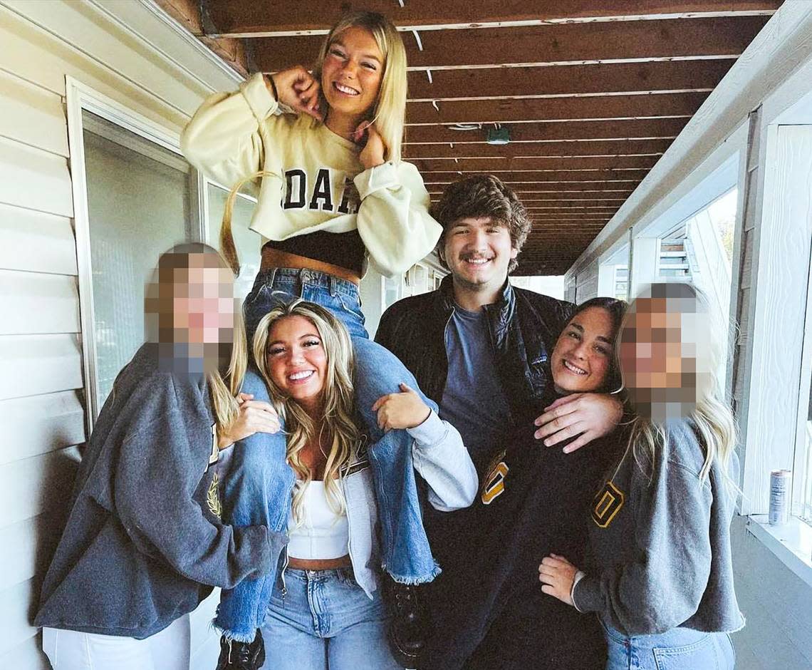 The four victims in the mass killing at the University of Idaho pose for a photo recently with two friends, who the Statesman has not identified and chose to blur their faces. At top left is Madison Mogen, 21, who is on the shoulders of Kaylee Goncalves, also 21. Ethan Chapin, 20, has his arm around Xana Kernodle, 20, his girlfriend.