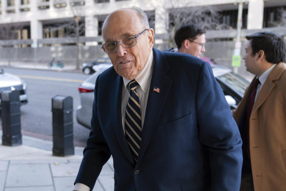 Former Mayor of New York Rudy Giuliani arrives at the federal courthouse in Washington, Wednesday, Dec. 13, 2023. The trial will determine how much Rudy Giuliani will have to pay two Georgia election workers who he falsely accused of fraud while pushing President Donald Trump's baseless claims after he lost the 2020 election. (AP Photo/Jose Luis Magana)