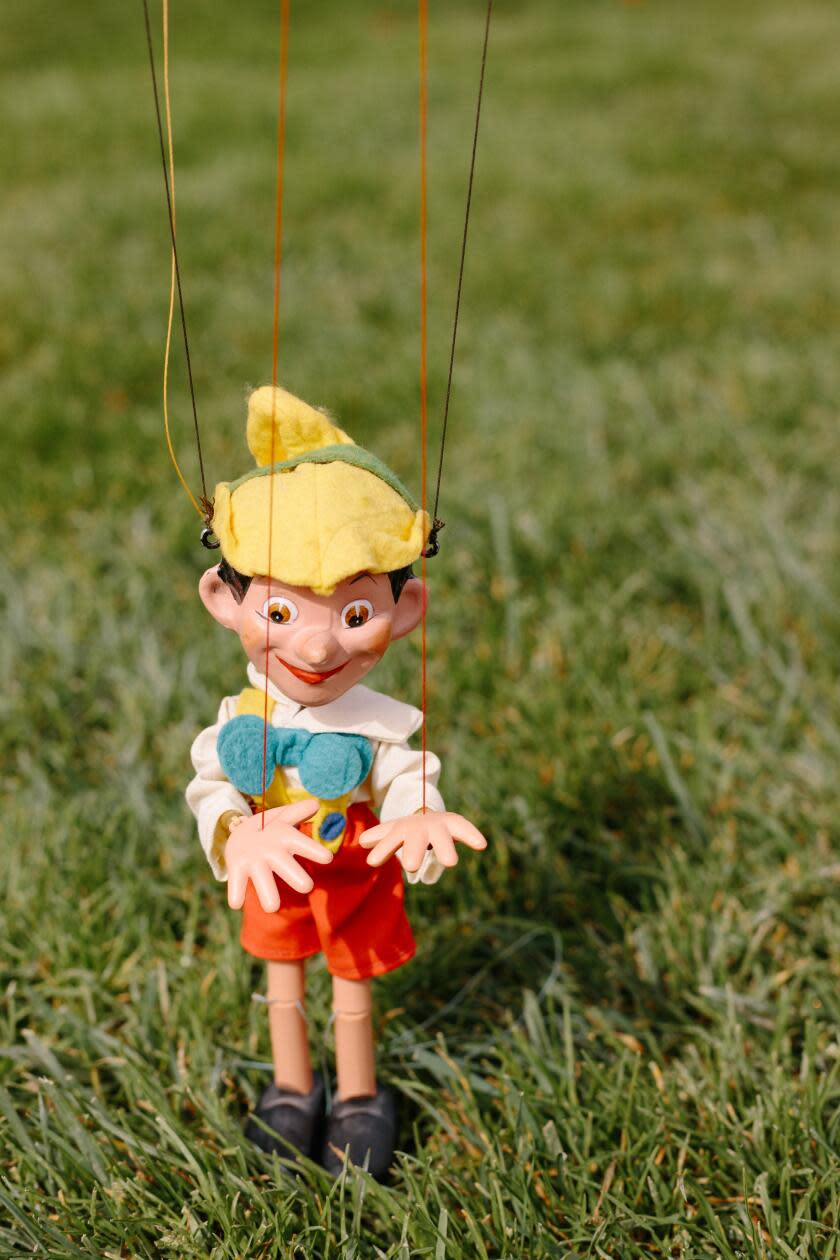 A vintage Pinocchio puppet.