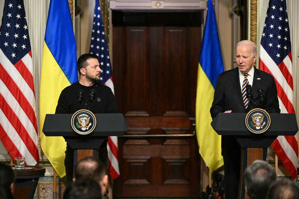 US President Joe Biden and Ukraine's President Volodymyr Zelensky hold a joint press conference in the Indian Treaty Room of the Eisenhower Executive Office Building, next to the White House, in Washington, DC, on December 12, 2023. (Photo by Mandel NGAN / AFP) (Photo by MANDEL NGAN/AFP via Getty Images)